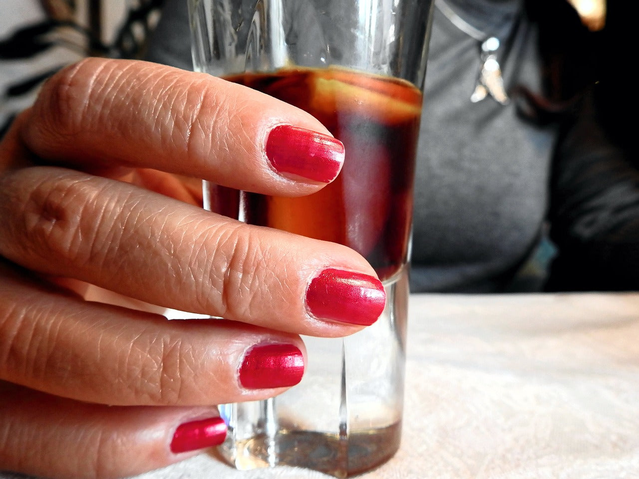 Why are my acrylic nails lifting?